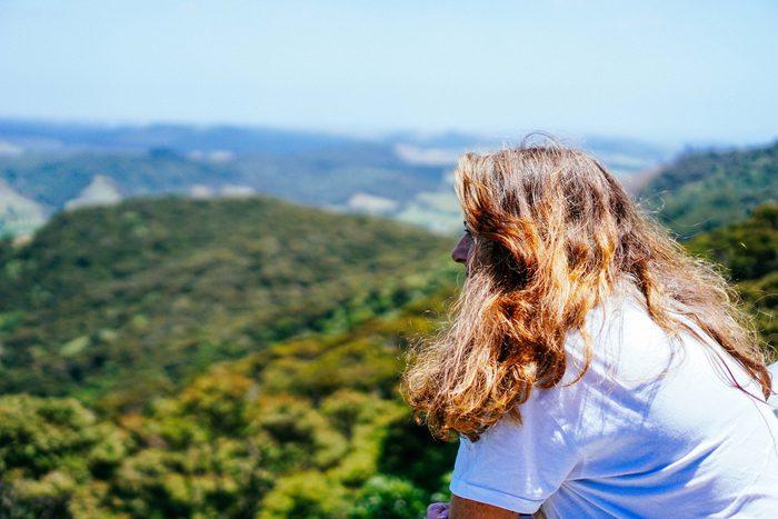 Artist Diane Gardiner looking out over the Northland coast, New Zealand